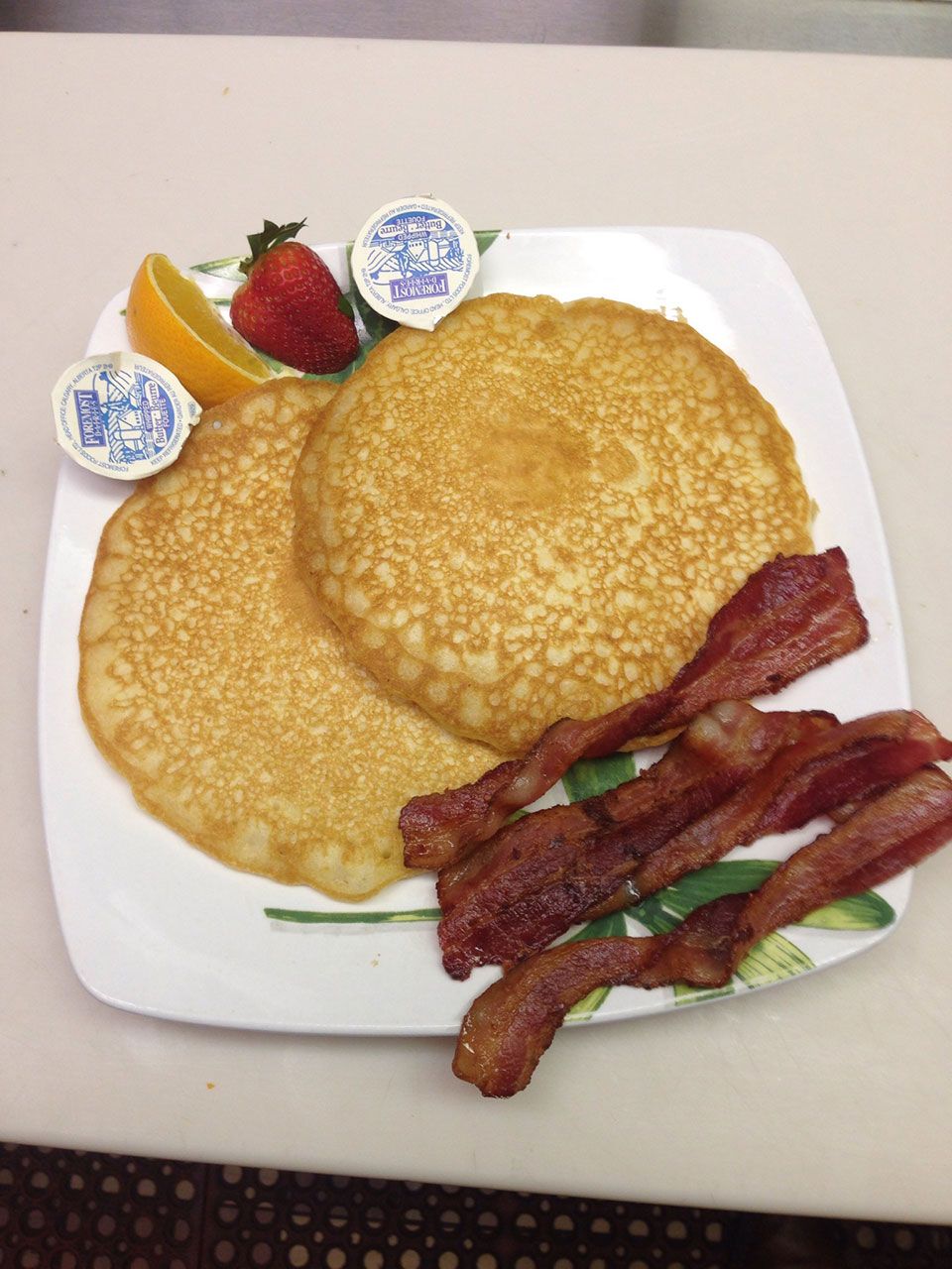 Stack of pancakes with bacon