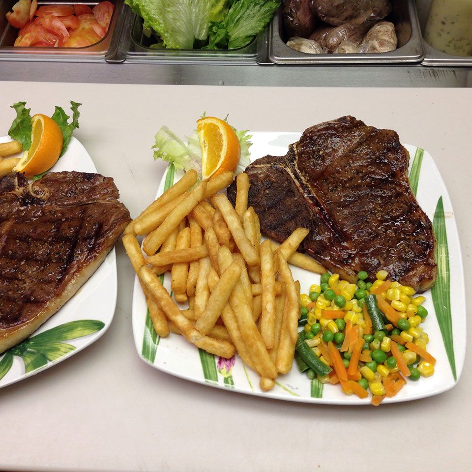 Grilled steak with crispy golden fries