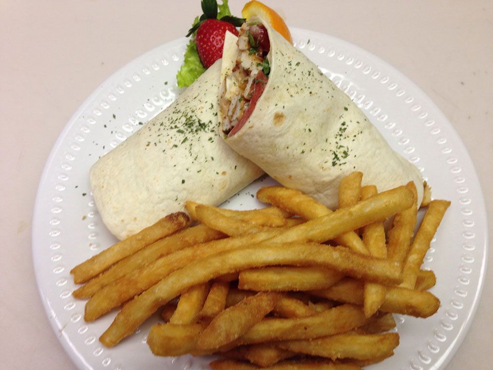 Grilled chicken wrap with fries